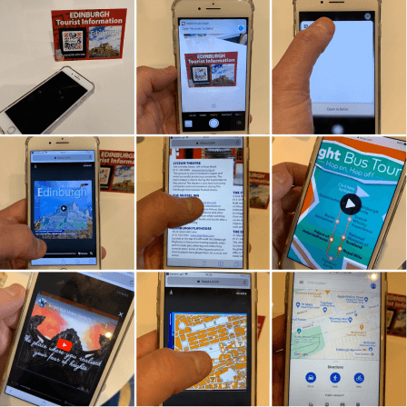 Una persona escanea el código QR de Downtown CityMaps de Edimburgo y consulta en su teléfono móvil la información disponible en la guía.