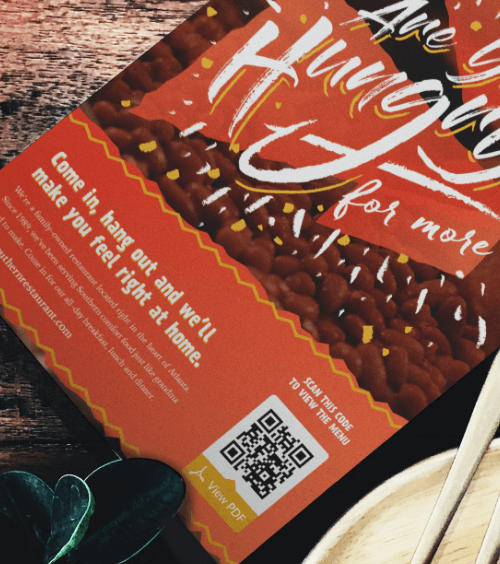 Un menú para llevar con un código QR que muestra una versión en PDF del menú cuando se escanea.