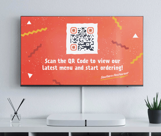 Ejemplo de un código QR en un anuncio de televisión de un restaurante.